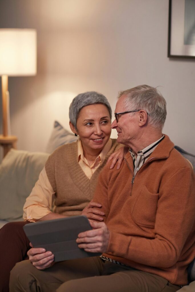 elderly couples sitting together