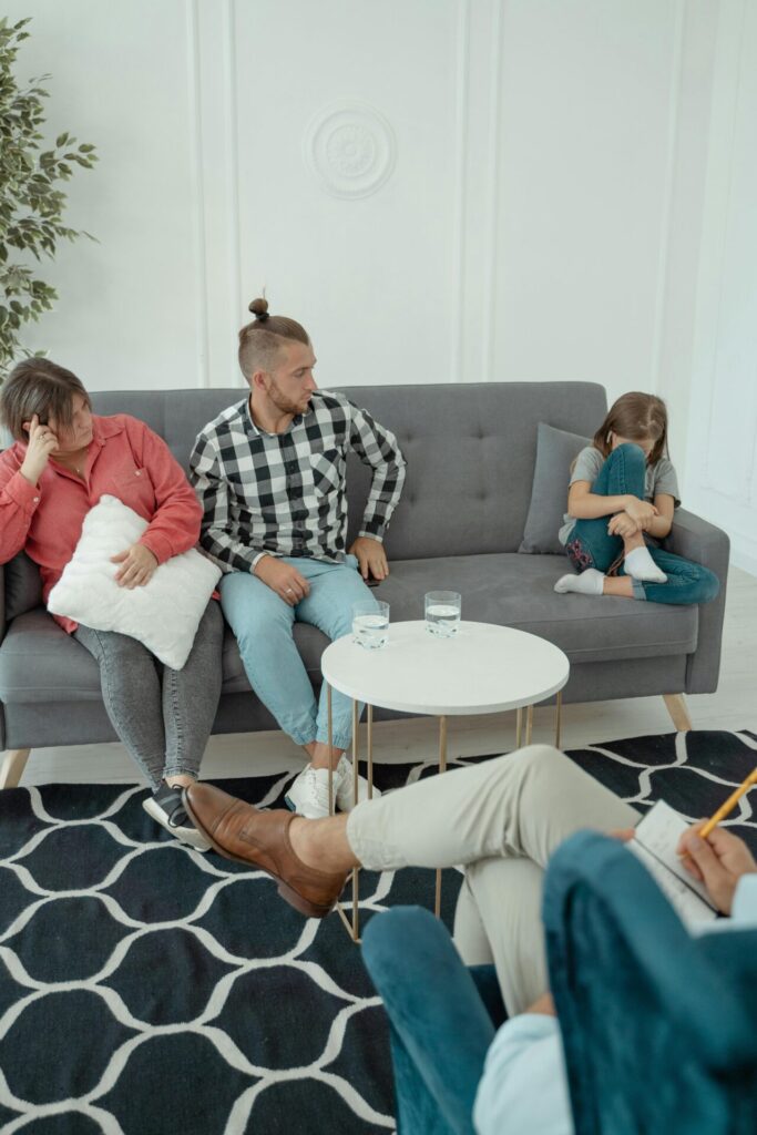 parents and child with a counsellor